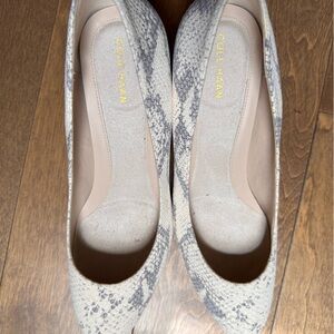 Never worn Cole Haan heels.  Slightly dusty inside